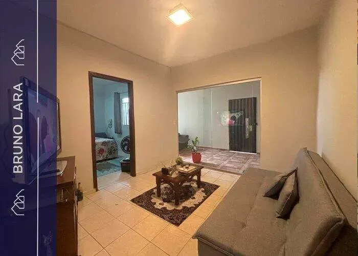 Casa com ponto comercial à venda no bairro Jardim das Roseiras - Igarapé/MG.