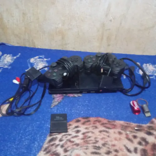 Vendo ps2 slim completo