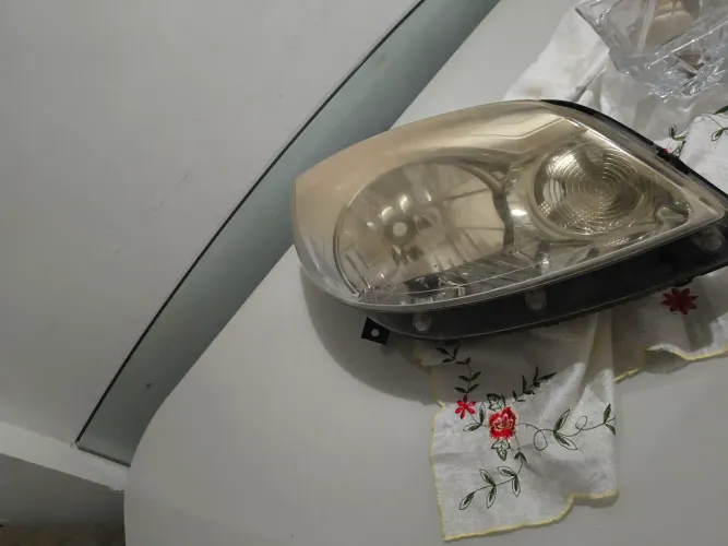 FAROL SANDERO 2012 [lado direito] ORIGINAL 