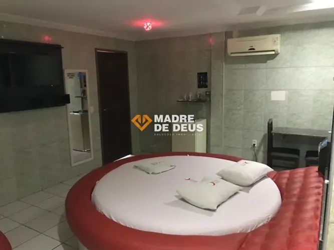 Motel em funcionamento com 19 quartos 9 quitinetes e 2 apartamentos.