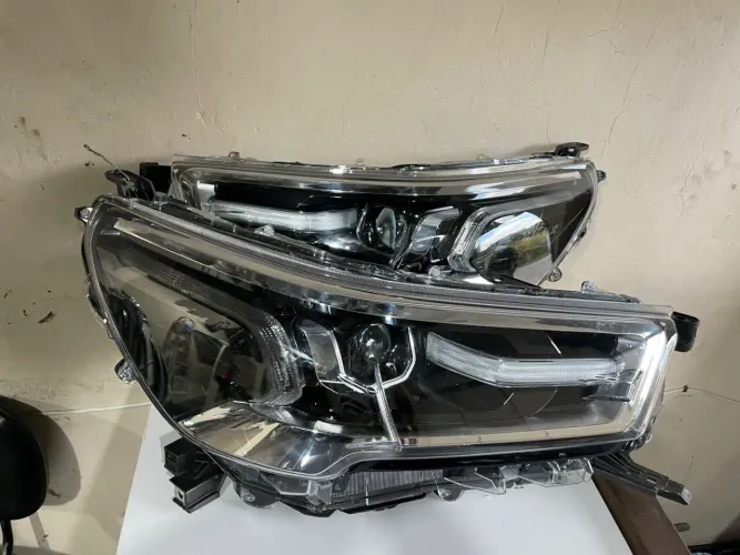 Par de Farol Hilux com Led Original