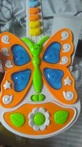 Guitarra Brinquedo Infantil com Borboleta - Usado**.