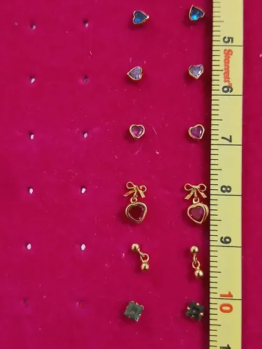 Par de brincos laço com coração 0,4g ouro 18k 750
