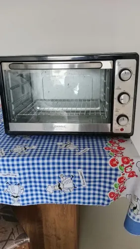 Vendo Forno elétrico funcionando perfeitamente , multifuncional 52 litros 