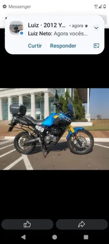 Moto bem conservada e bem equipada 