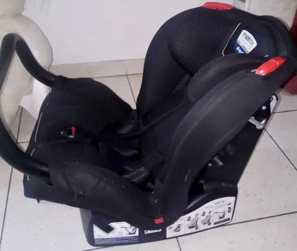 Cadeira Burigotto Matrix Evolution K 0 a 25kg | SEMINOVA | BARRA FRONTAL