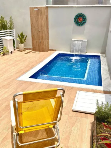 Casa a Venda em Condominio Fechado a 300 Metros da Praia de Camburi.