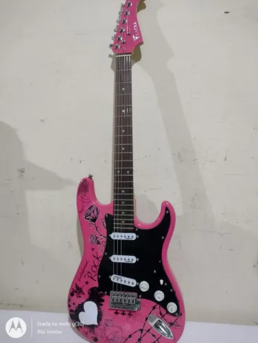 Guitarra Eagle Stratocaster rosa, regulada por nosso luchier, blindada