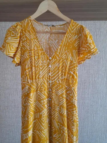 Vestido amarelo estampa étnica