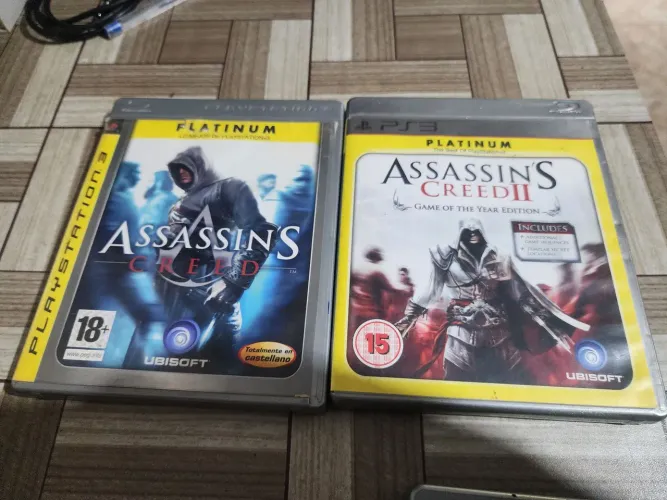 Par de jogos ps3 Assassin s creed 1 e 2  platinum edition 