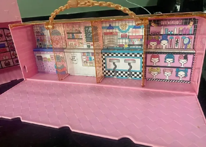 Brinquedo expositor LOL