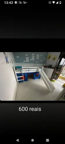 Cama cazinha motessoriana com escada e escorregador.