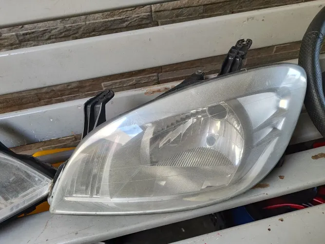 Volante, farol e tampão do celta