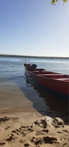 Canoa medindo 6mts com motor Honda 13hp vendou ou troco em cinquentinha