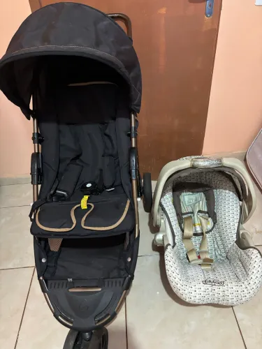 Carrinho de bebê e bebê conforto 