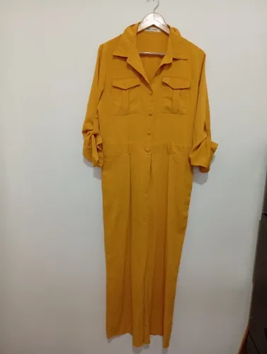  macacão com manga 3/4  