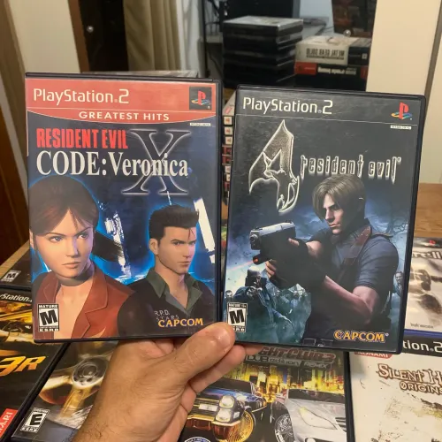 Jogos ps2 resident evil code Veronica x e 4 originais play 2 PlayStation