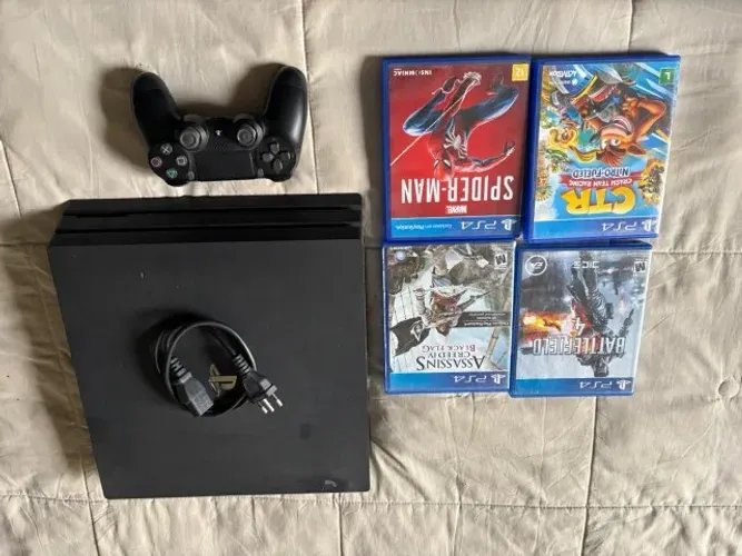 PS4 Pro + 4 jogos + 1 joystick