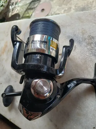 Molinete piooner +carretilha pesca pesada