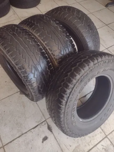 4 pneus semi novos 265/70/16 $ 850