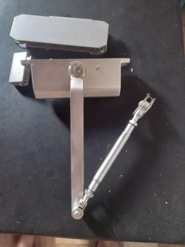 Vendo essa mola para porta de vidro