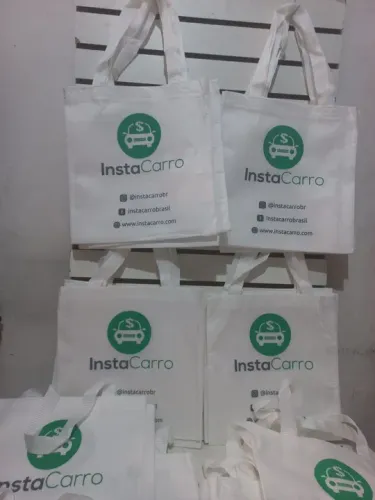 500 peças de sacolas ecológica 33x35 novas está com logotipo 