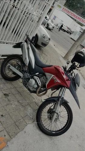 XRE 300 , em bom estado , doc em dia . 11,500R$