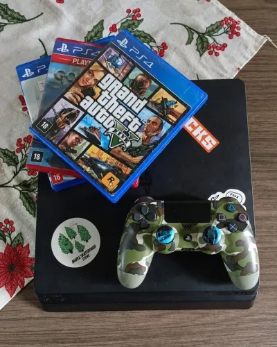 Vendo Ps4 slim 500Gb + Controle original com grips analógico+ 3 jogos de mídia física