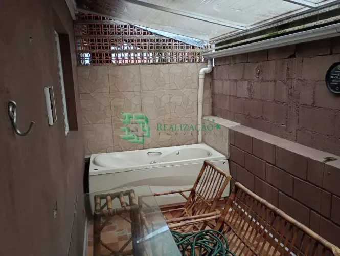 casa de condominio em itanhaem com hidromassagem