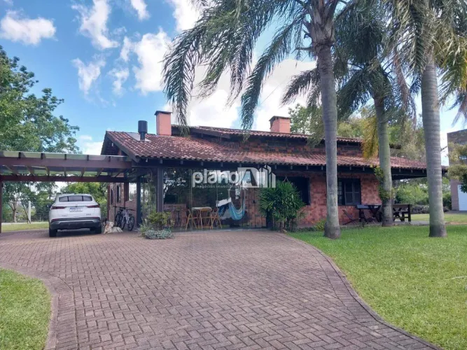 Casa em Condomínio Frente | 3 Quartos (1 Suíte), Varanda Gourmet e Lazer Completo em Grava