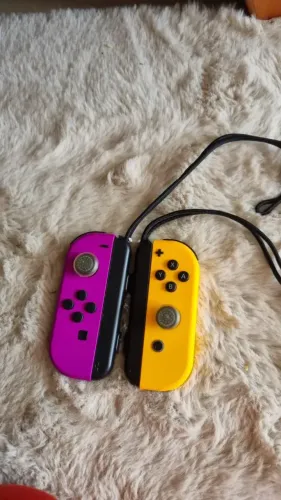 Controle Nintendo Joy-Con Roxo com Laranja para Nintendo Switch Original