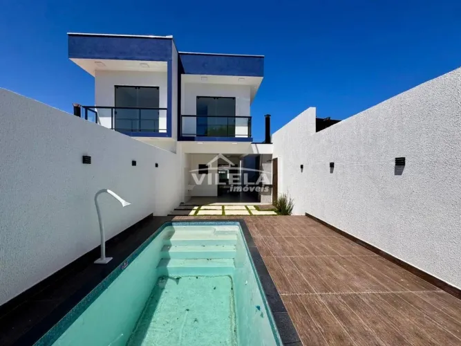 Sobrado Novo com Piscina e Área Gourmet no Bairro Porto Novo -Carguatatuba-Sp