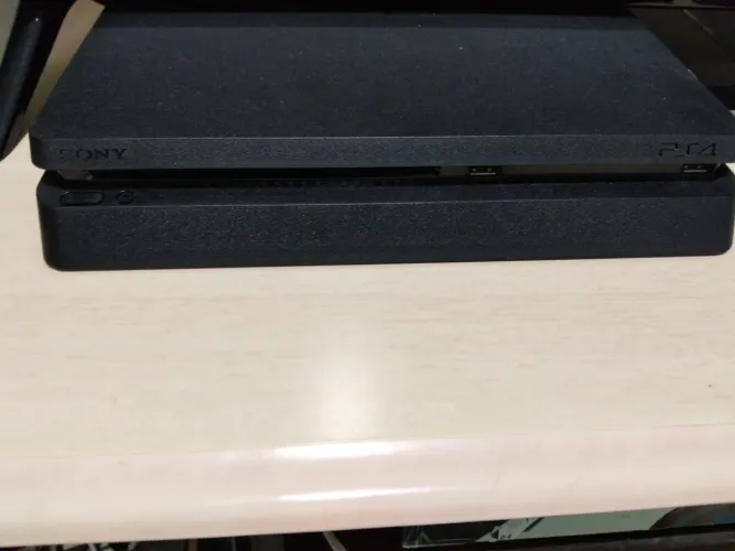 Ps4 slim 1tb desbloqueado 9.0 vendo troco