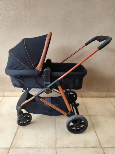 Carrinho de bebê Burigotto revert com bebê conforto preto e cobre