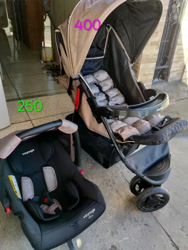 Carrinho de bebê e cadeira seme nova