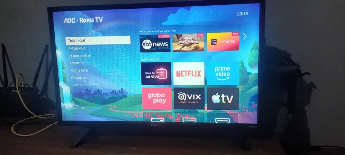 Troco Smart tv 32 aoc roku canais grátis