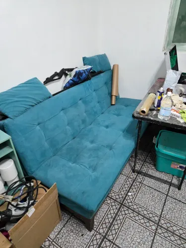 Sofá cama verde turquesa