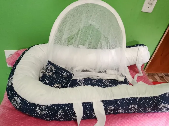 Ninho de bebê,bomba de leite,lixa de unha e kit higiene.