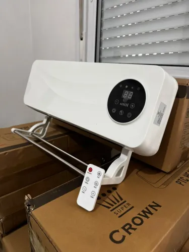 Aquecedor de parede com suporte para toalha