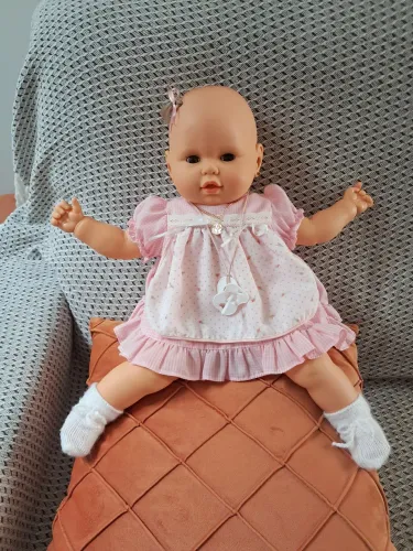 Boneca bebezinho da estrela com olhos castanhos
