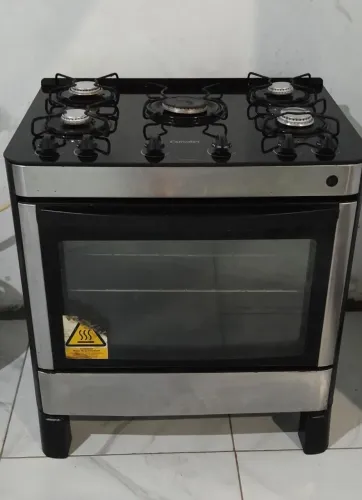 Fogão mesa de vidro, funcionando às 5 bocas e o forno, faço entrega 