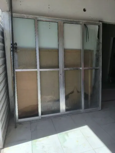 Porta de sala 4 folhas sendo 2 fixas 