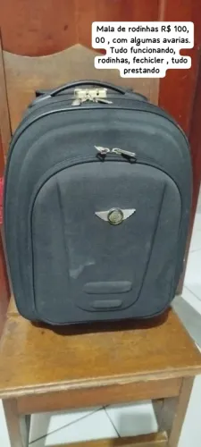 Vendo mala de rodinhas, com algumas escorriacoes * 