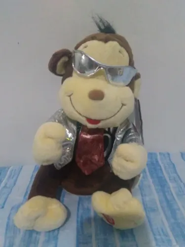 Bicho de pelúcia com música e dança
