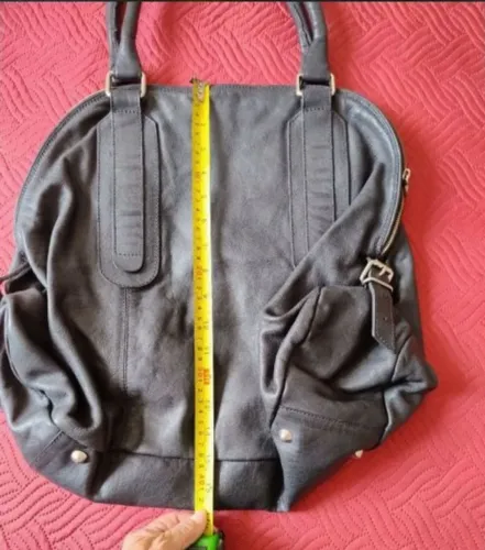 Bolsa couro legítimo grande, ideal para viagem, faculdade, trabalho, carrega muitos itens.