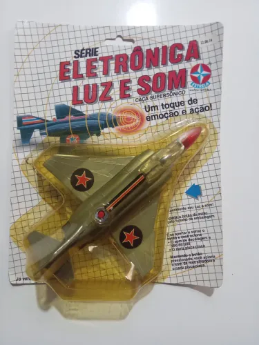 Caça Supersônico série eletrônica luz e som Brinquedos Estrela ler descrição