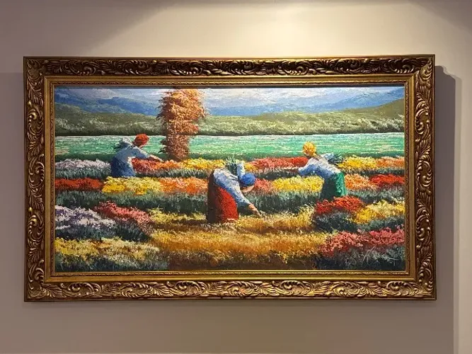 Quadro com motivo floral e moldura especial