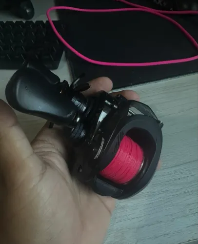 Carretilha de pesca Brisa bg Lado esquerdo