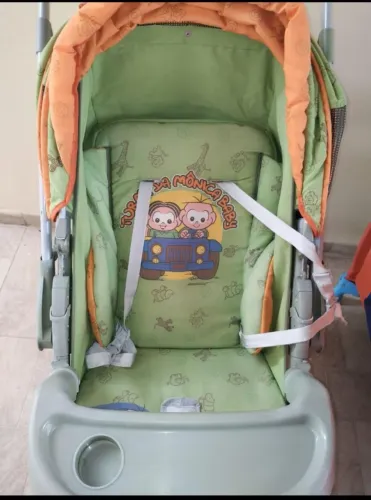 Carrinho de bebê da turma da Monica 