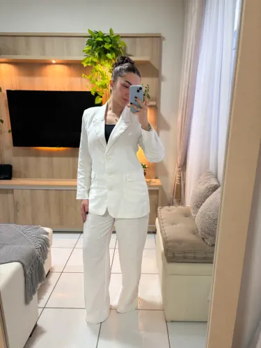 Blazer de alfaiataria sob medida.